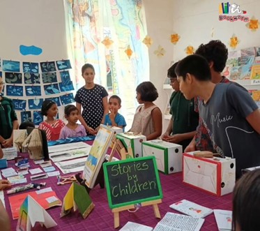 Cross-sharing of stories by children at a Bookworm library